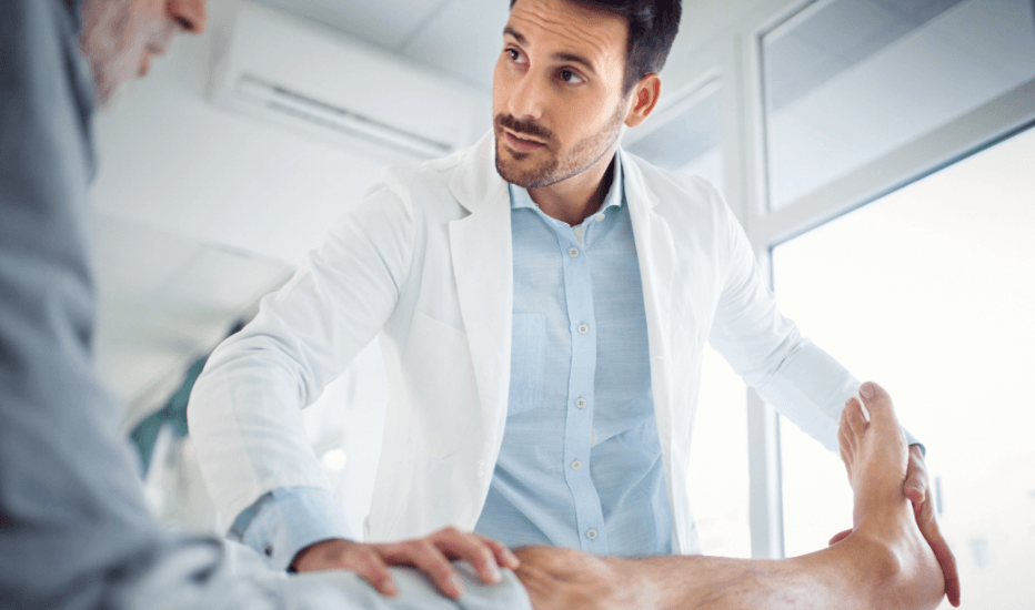 Healthcare professional examining a patient's knee